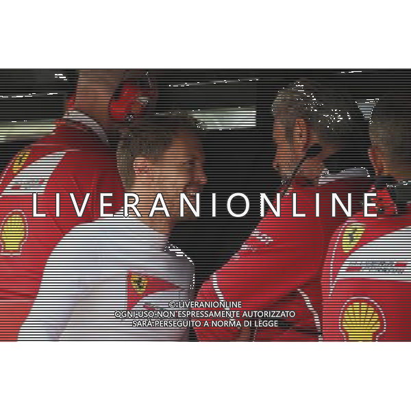 (L to R): Sebastian Vettel (GER) Ferrari with Maurizio Arrivabene (ITA) Ferrari Team Principal. 01.09.2017. Formula 1 World Championship, Rd 13, Italian Grand Prix, Monza, Italy, Practice Day. AG ALDO LIVERANI SAS ONLY ITALY