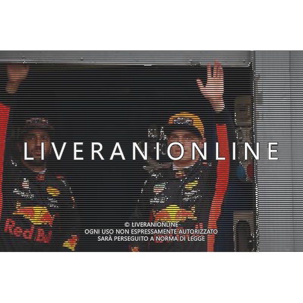 (L to R): Daniel Ricciardo (AUS) Red Bull Racing with team mate Max Verstappen (NLD) Red Bull Racing in qualifying parc ferme. 02.09.2017. Formula 1 World Championship, Rd 13, Italian Grand Prix, Monza, Italy, Qualifying Day. AG ALDO LIVERANI SAS ONLY ITALY