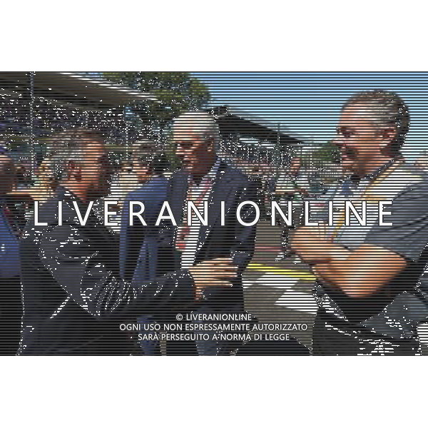 (L to R): Jean Alesi (FRA) with Marco Tronchetti Provera (ITA) Pirelli Chairman and Mario Isola (ITA) Pirelli Racing Manager, on the grid. 03.09.2017. Formula 1 World Championship, Rd 13, Italian Grand Prix, Monza, Italy, Race Day. AG ALDO LIVERANI SAS ONLY ITALY