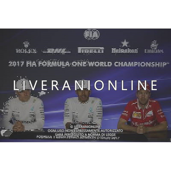 Lewis Hamilton (GBR) Mercedes AMG F1 W08 with Valtteri Bottas (FIN) Mercedes AMG F1 W08 and Sebastian Vettel (GER) Ferrari. 03.09.2017. Formula 1 World Championship, Rd 13, Italian Grand Prix, Monza, Italy, Race Day. AG ALDO LIVERANI SAS ONLY ITALY