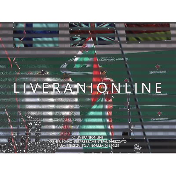 Monza ( MB ) 03/09/2017 Autodromo Nazionale di Monza. Formula 1 Gran Premio Heineken díItalia 2017 Nella foto: 2 arrivato Valtteri Bottas ( FIN ), 1 arrivato Lewis Hamilton ( GBR ) e 3* arrivato Sebastian Vettel ( GER ) sul podio durante la premiazione PH Lauro Montagnini *** Local Caption *** AG ALDO LIVERANI SAS *** Local Caption *** AG ALDO LIVERANI SAS