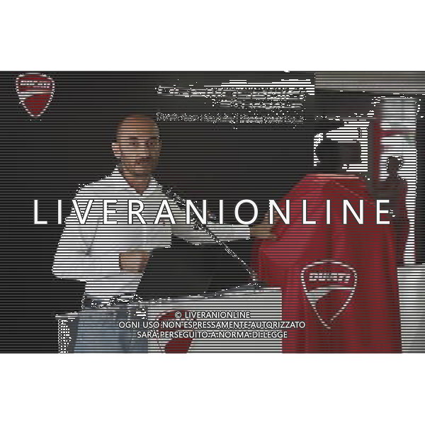 Motomondiale Gran Premio Tribul Mastercard di San Marino e della Riviera di Rimini 07/09/2017 nella foto: Claudio Domenicali presenta il nuovo motore desmosedici stradale ©Claudio Zamagni/Agenzia Aldo Liverani Claudio Domenicali Presents new desmosedici engine during MotoGP Tribul Mastercard of San Marino on September 07, 2017 at Misano World Circuit Marco Simoncelli Misano Adriatico Italy photo credit by Claudio Zamagni/Aldo Liverani Photo Agency 