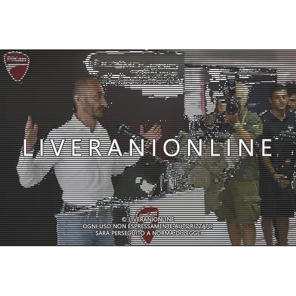 Motomondiale Gran Premio Tribul Mastercard di San Marino e della Riviera di Rimini 07/09/2017 nella foto: Claudio Domenicali mostra il nuovo motore desmosedici stradale ©Claudio Zamagni/Agenzia Aldo Liverani Claudio Domenicali shows new desmosedici engine during MotoGP Tribul Mastercard of San Marino on September 07, 2017 at Misano World Circuit Marco Simoncelli Misano Adriatico Italy photo credit by Claudio Zamagni/Aldo Liverani Photo Agency 