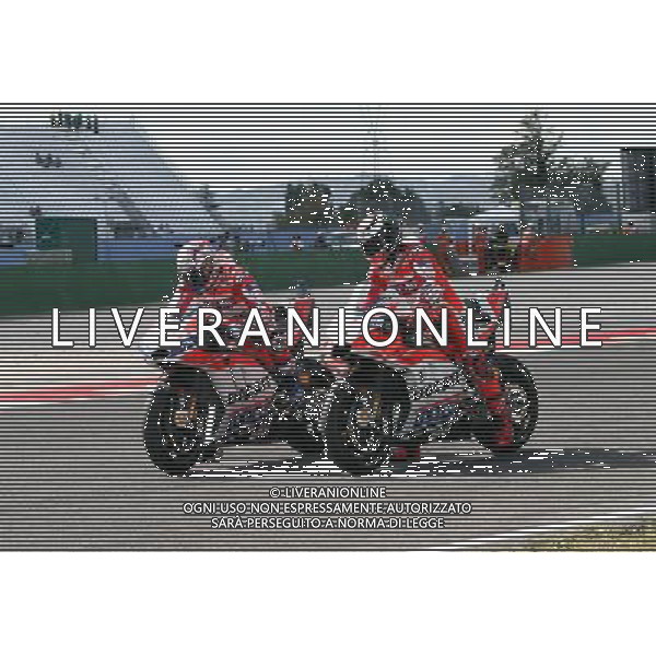 Misano Adriatico ( RN ) 08/09/2017 Misano World Circuit Marco Simoncelli. Gran Premio Tribul Mastercard di San Marino e della Riviera di Rimini 2017 - MOTOGP Nella foto: Andrea Dovizioso ( ITA ) su DUCATI con Jorge Lorenzo ( ESP ) su DUCATI prove di partenza PH Lauro Montagnini *** Local Caption *** ag aldo liverani sas *** Local Caption *** ag aldo liverani sas