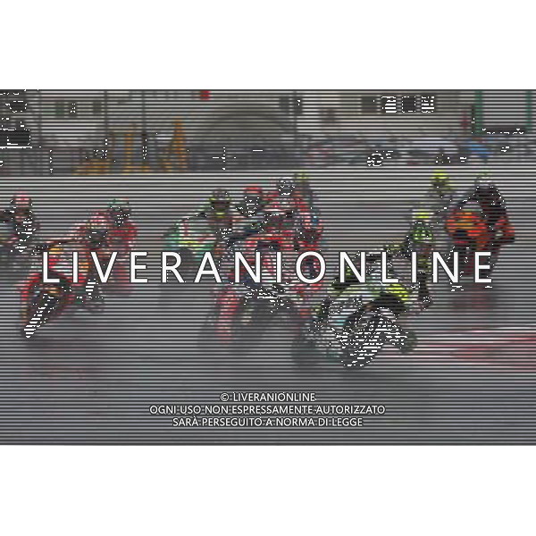 Misano Adriatico ( RN ) 10/09/2017 Misano World Circuit Marco Simoncelli. Gran Premio Tribul Mastercard di San Marino e della Riviera di Rimini 2017 - MOTOGP Nella foto: Danilo Petrucci ( ITA ) su DUCATI in mezzo al gruppo di moto PH Lauro Montagnini AG ALDO LIVERANI SAS