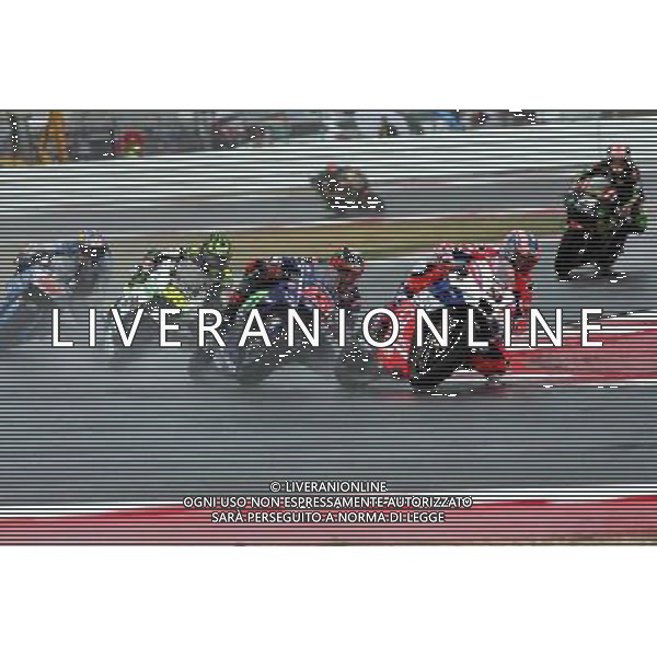 Misano Adriatico ( RN ) 10/09/2017 Misano World Circuit Marco Simoncelli. Gran Premio Tribul Mastercard di San Marino e della Riviera di Rimini 2017 - MOTOGP Nella foto: Maverick ViÒales ( ESP ) su YAMAHA in mezzo al gruppo di moto PH Lauro Montagnini AG ALDO LIVERANI SAS