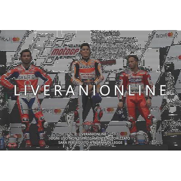 Misano Adriatico ( RN ) 10/09/2017 Misano World Circuit Marco Simoncelli. Gran Premio Tribul Mastercard di San Marino e della Riviera di Rimini 2017 - MOTOGP Premiazione Nella foto: 2 Class. Danilo Petrucci ( ITA ) su DUCATI, il vincitore Marc Marquez ( ESP ) su HONDA e 3 Class. Andrea Dovizioso ( ITA ) su DUCATI sul podio PH Lauro Montagnini AG ALDO LIVERANI SAS