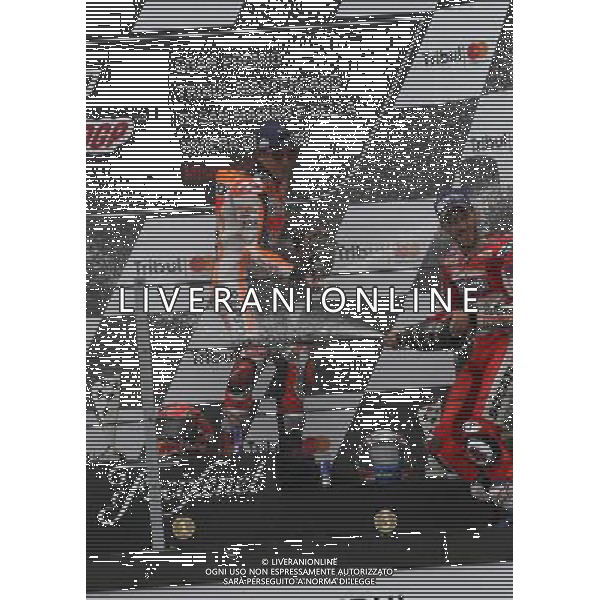 Misano Adriatico ( RN ) 10/09/2017 Misano World Circuit Marco Simoncelli. Gran Premio Tribul Mastercard di San Marino e della Riviera di Rimini 2017 - MOTOGP Premiazione Nella foto: Il vincitore Marc Marquez ( ESP ) su HONDA e 3 Class. Andrea Dovizioso ( ITA ) su DUCATI sul podio mentre esulta PH Lauro Montagnini AG ALDO LIVERANI SAS