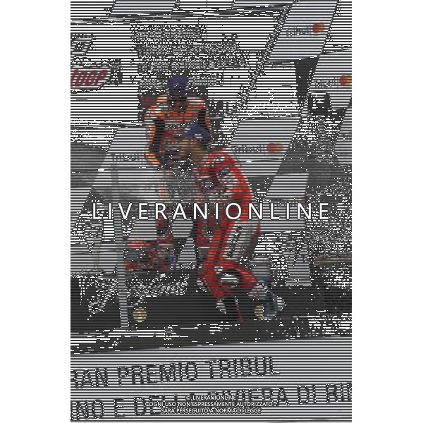 Misano Adriatico ( RN ) 10/09/2017 Misano World Circuit Marco Simoncelli. Gran Premio Tribul Mastercard di San Marino e della Riviera di Rimini 2017 - MOTOGP Premiazione Nella foto: 2 Class. Danilo Petrucci ( ITA ) su DUCATI, il vincitore Marc Marquez ( ESP ) su HONDA e 3 Class. Andrea Dovizioso ( ITA ) su DUCATI sul podio PH Lauro Montagnini AG ALDO LIVERANI SAS