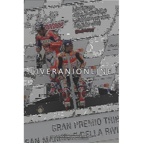 Misano Adriatico ( RN ) 10/09/2017 Misano World Circuit Marco Simoncelli. Gran Premio Tribul Mastercard di San Marino e della Riviera di Rimini 2017 - MOTOGP Premiazione Nella foto: 2 Class. Danilo Petrucci ( ITA ) su DUCATI, il vincitore Marc Marquez ( ESP ) su HONDA e 3 Class. Andrea Dovizioso ( ITA ) su DUCATI sul podio PH Lauro Montagnini AG ALDO LIVERANI SAS