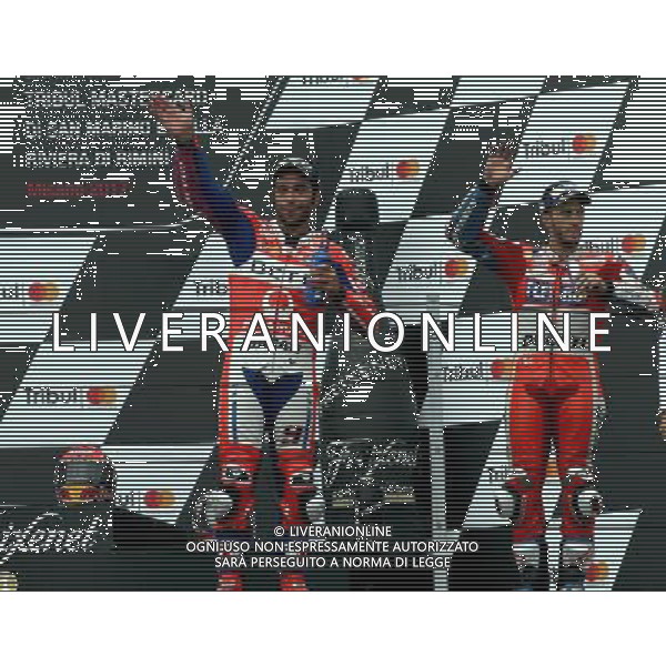 Misano Adriatico ( RN ) 10/09/2017 Misano World Circuit Marco Simoncelli. Gran Premio Tribul Mastercard di San Marino e della Riviera di Rimini 2017 - MOTOGP Premiazione Nella foto: 2 Class. Danilo Petrucci ( ITA ) su DUCATI, il vincitore Marc Marquez ( ESP ) su HONDA e 3 Class. Andrea Dovizioso ( ITA ) su DUCATI sul podio PH Lauro Montagnini AG ALDO LIVERANI SAS
