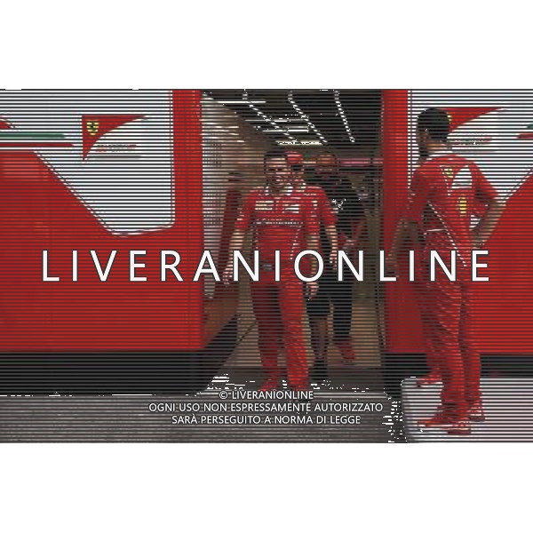 Kimi Raikkonen (FIN) Ferrari with a team member. 14.09.2017. Formula 1 World Championship, Rd 14, Singapore Grand Prix, Marina Bay Street Circuit, Singapore, Preparation Day. AG ALDO LIVERANI SAS ONLY ITALY