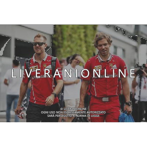 Sebastian Vettel (GER) Ferrari with Antti Kontsas (FIN) Personal Trainer. 15.09.2017. Formula 1 World Championship, Rd 14, Singapore Grand Prix, Marina Bay Street Circuit, Singapore, Practice Day. AG ALDO LIVERANI SAS ONLY ITALY