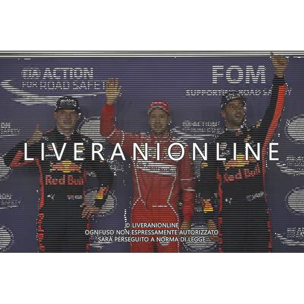 Pole for Sebastian Vettel (GER) Ferrari SF70H, 2nd for Max Verstappen (NLD) Red Bull Racing RB13 and 3rd for Daniel Ricciardo (AUS) Red Bull Racing RB13. 16.09.2017. Formula 1 World Championship, Rd 14, Singapore Grand Prix, Marina Bay Street Circuit, Singapore, Qualifying Day. AG ALDO LIVERANI SAS ONLY ITALY