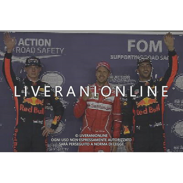 Pole for Sebastian Vettel (GER) Ferrari SF70H, 2nd for Max Verstappen (NLD) Red Bull Racing RB13 and 3rd for Daniel Ricciardo (AUS) Red Bull Racing RB13. 16.09.2017. Formula 1 World Championship, Rd 14, Singapore Grand Prix, Marina Bay Street Circuit, Singapore, Qualifying Day. AG ALDO LIVERANI SAS ONLY ITALY