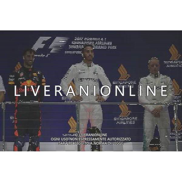 1st place Lewis Hamilton (GBR) Mercedes AMG F1 W08, 2nd for Daniel Ricciardo (AUS) Red Bull Racing RB13 and 3rd for Valtteri Bottas (FIN) Mercedes AMG F1. 17.09.2017. Formula 1 World Championship, Rd 14, Singapore Grand Prix, Marina Bay Street Circuit, Singapore, Race Day. AG ALDO LIVERANI SAS ONLY ITALY