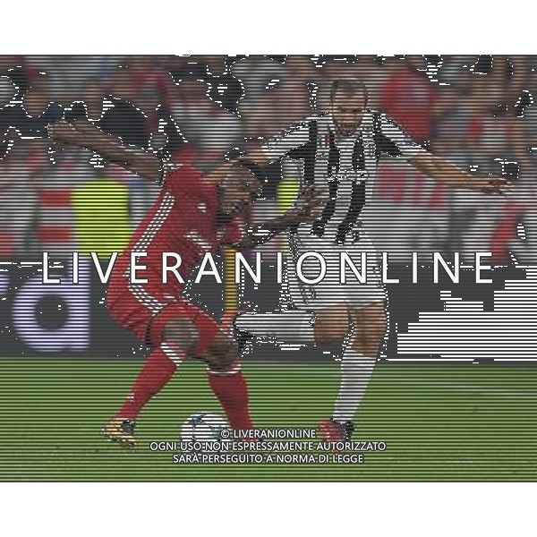 UEFA Champions League 2017/2018 Gruppo D Torino - 27.09.2017 Juventus-Olympiacos Nella Foto:Chiellini Giorgio - Emenike Emmanuel /Ph.Vitez-Ag. Aldo Liverani