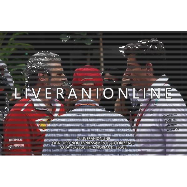 (L to R): Maurizio Arrivabene (ITA) Ferrari Team Principal with Niki Lauda (AUT) Mercedes Non-Executive Chairman and Toto Wolff (GER) Mercedes AMG F1 Shareholder and Executive Director. 29.09.2017. Formula 1 World Championship, Rd 15, Malaysian Grand Prix, Sepang, Malaysia, Friday. AG ALDO LIVERANI SAS ONLY ITALY