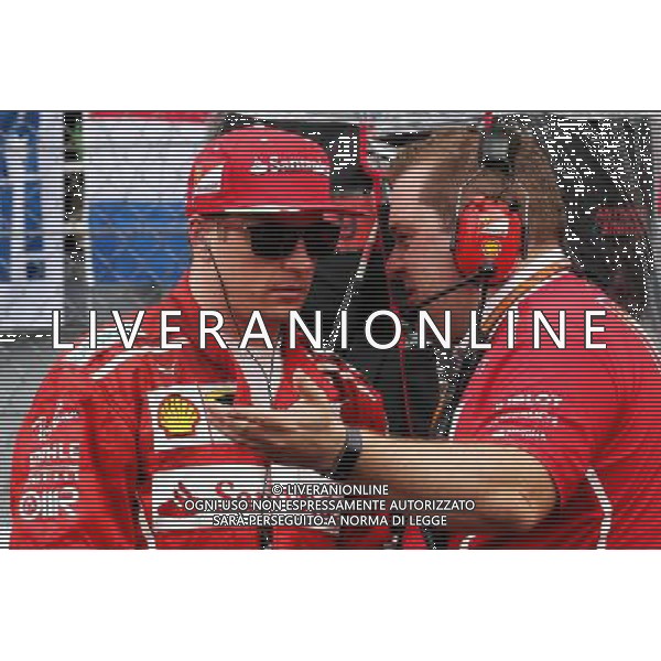 (L to R): Kimi Raikkonen (FIN) Ferrari with Dave Greenwood (GBR) Ferrari Race Engineer on the grid. 01.10.2017. Formula 1 World Championship, Rd 15, Malaysian Grand Prix, Sepang, Malaysia, Sunday. AG ALDO LIVERANI SAS ONLY ITALY