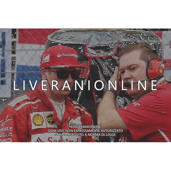 (L to R): Kimi Raikkonen (FIN) Ferrari with Dave Greenwood (GBR) Ferrari Race Engineer on the grid. 01.10.2017. Formula 1 World Championship, Rd 15, Malaysian Grand Prix, Sepang, Malaysia, AG ALDO LIVERANI SAS ONLY ITALY