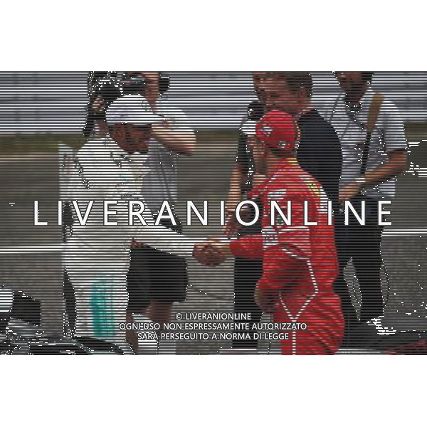 (L to R): Lewis Hamilton (GBR) Mercedes AMG F1 celebrates his pole position in qualifying parc ferme with third placed Sebastian Vettel (GER) Ferrari. 07.10.2017. Formula 1 World Championship, Rd 16, Japanese Grand Prix, Suzuka, Japan, Qualifying Day. / AGENZIA ALDO LIVERANI SAS - ITALY ONLY EDITORIAL USE ONLY - Prove Ufficiali Qualifiche Gp F1 Giappone - Suzuka 7 ottobre 2017