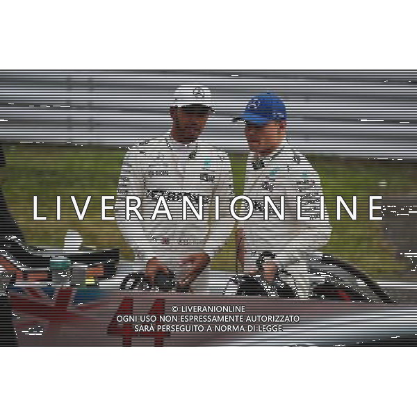 (L to R): Lewis Hamilton (GBR) Mercedes AMG F1 with team mate Valtteri Bottas (FIN) Mercedes AMG F1 in qualifying parc ferme. 07.10.2017. Formula 1 World Championship, Rd 16, Japanese Grand Prix, Suzuka, Japan, Qualifying Day. / AGENZIA ALDO LIVERANI SAS - ITALY ONLY EDITORIAL USE ONLY - Prove Ufficiali Qualifiche Gp F1 Giappone - Suzuka 7 ottobre 2017