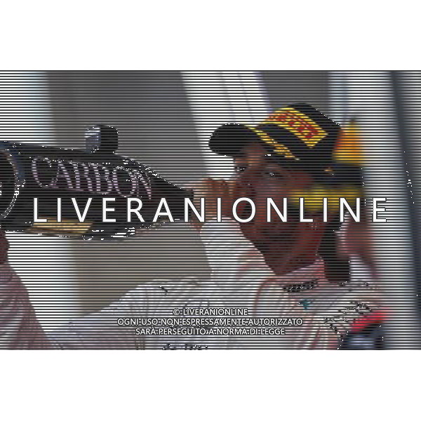 Race winner Lewis Hamilton (GBR) Mercedes AMG F1 celebrates on the podium. 08.10.2017. Formula 1 World Championship, Rd 16, Japanese Grand Prix, Suzuka, Japan, Race Day. AG ALDO LIVERANI SAS ONLY ITALY