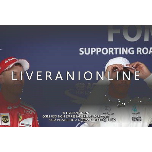 Sebastian Vettel (GER) Scuderia Ferrari and Lewis Hamilton (GBR) Mercedes AMG F1 21.10.2017. Formula 1 World Championship, Rd 17, United States Grand Prix, Austin, Texas, USA, Qualifying Day. AG ALDO LIVERANI SAS ONLY ITALY