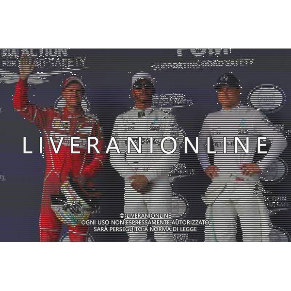 Qualifying top three in parc ferme (L to R): Sebastian Vettel (GER) Ferrari, second; Lewis Hamilton (GBR) Mercedes AMG F1, pole position; Valtteri Bottas (FIN) Mercedes AMG F1, third. 21.10.2017. Formula 1 World Championship, Rd 17, United States Grand Prix, Austin, Texas, USA, Qualifying Day. AG ALDO LIVERANI SAS ONLY ITALY