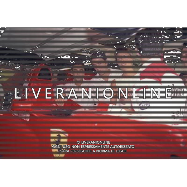 05-09-1997 GP MONZA F1â€¨NELLA FOTO ALESSANDRO COSTACURTA E LA MOGLIE MARTINA COLOMBARI NEI BOXâ€¨AG ALDO LIVERANI SASâ€¨