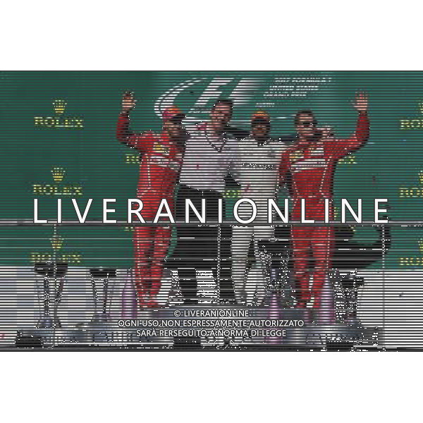 The podium (L to R): Sebastian Vettel (GER) Ferrari, second; James Allison (GBR) Mercedes AMG F1 Technical Director; Lewis Hamilton (GBR) Mercedes AMG F1, race winner; Kimi Raikkonen (FIN) Ferrari, third. 22.10.2017. Formula 1 World Championship, Rd 17, United States Grand Prix, Austin, Texas, USA, Race Day. / AGENZIA ALDO LIVERANI SAS - ITALY ONLY EDITORIAL USE ONLY