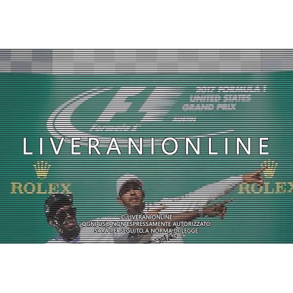 (L to R): Usain Bolt (JAM) Athlete with Lewis Hamilton (GBR) Mercedes AMG F1 on the podium. 22.10.2017. Formula 1 World Championship, Rd 17, United States Grand Prix, Austin, Texas, USA, Race Day. / AGENZIA ALDO LIVERANI SAS - ITALY ONLY EDITORIAL USE ONLY