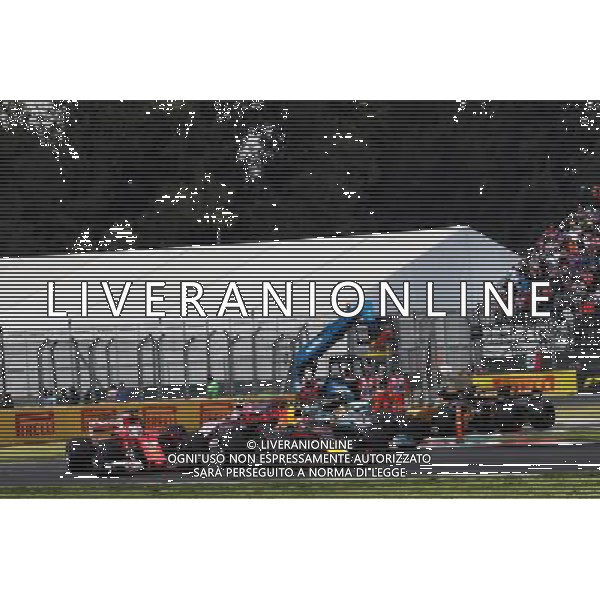 Sebastian Vettel (GER) Ferrari SF70H, Max Verstappen (NLD) Red Bull Racing RB13, and Lewis Hamilton (GBR) Mercedes AMG F1 W08 battle for the lead at the start of the race. 29.10.2017. Formula 1 World Championship, Rd 18, Mexican Grand Prix, Mexico City, Mexico, Race Day. AG ALDO LIVERANI SAS ONLY ITALY