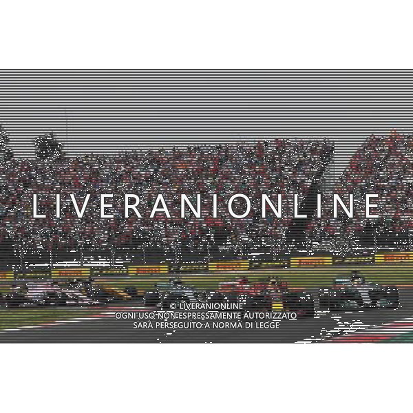 Sebastian Vettel (GER) Ferrari SF70H, Max Verstappen (NLD) Red Bull Racing RB13, and Lewis Hamilton (GBR) Mercedes AMG F1 W08 battle for the lead at the start of the race. 29.10.2017. Formula 1 World Championship, Rd 18, Mexican Grand Prix, Mexico City, Mexico, Race Day. AG ALDO LIVERANI SAS ONLY ITALY
