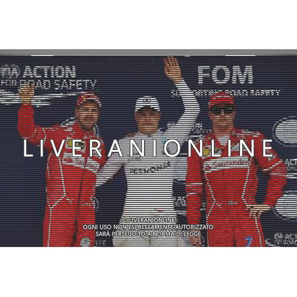 Qualifying top three in parc ferme (L to R): Sebastian Vettel (GER) Ferrari, second; Valtteri Bottas (FIN) Mercedes AMG F1, pole position; Kimi Raikkonen (FIN) Ferrari, third. 11.11.2017. Formula 1 World Championship, Rd 19, Brazilian Grand Prix, Sao Paulo, Brazil, Qualifying Day. - www.xpbimages.com, EMail: requests@xpbimages.com - copy of publication required for printed pictures. Every used picture is fee-liable. Â© Copyright: Batchelor / XPB Images/Ag. Aldo Liverani s.a.s.
