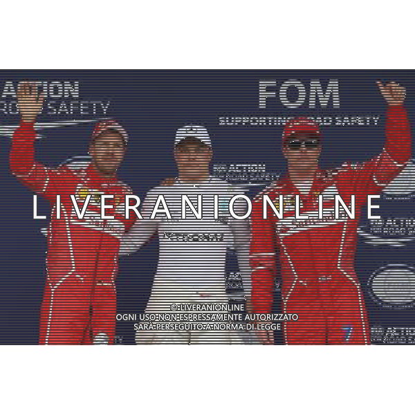 Qualifying top three in parc ferme (L to R): Sebastian Vettel (GER) Ferrari, second; Valtteri Bottas (FIN) Mercedes AMG F1, pole position; Kimi Raikkonen (FIN) Ferrari, third. 11.11.2017. Formula 1 World Championship, Rd 19, Brazilian Grand Prix, Sao Paulo, Brazil, Qualifying Day. - www.xpbimages.com, EMail: requests@xpbimages.com - copy of publication required for printed pictures. Every used picture is fee-liable. Â¬Â© Copyright: Batchelor / XPB Images/Ag. Aldo Liverani s.a.s.
