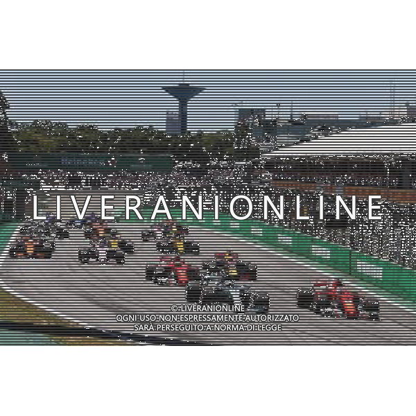 (L to R): Valtteri Bottas (FIN) Mercedes AMG F1 W08 and Sebastian Vettel (GER) Ferrari SF70H battle for the lead at the start of the race. 12.11.2017. Formula 1 World Championship, Rd 19, Brazilian Grand Prix, Sao Paulo, Brazil, Race Day. AG ALDO LIVERANI SAS ONLY ITALY