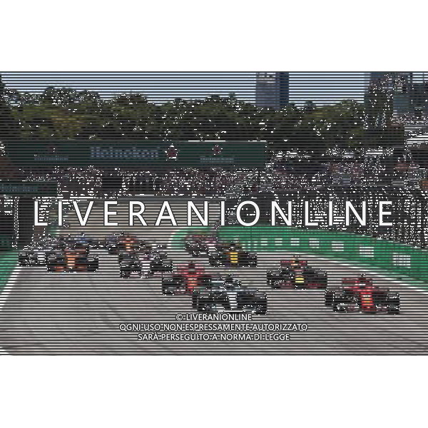 (L to R): Valtteri Bottas (FIN) Mercedes AMG F1 W08 and Sebastian Vettel (GER) Ferrari SF70H at the start of the race. 12.11.2017. Formula 1 World Championship, Rd 19, Brazilian Grand Prix, Sao Paulo, Brazil, Race Day. AG ALDO LIVERANI SAS ONLY ITALY