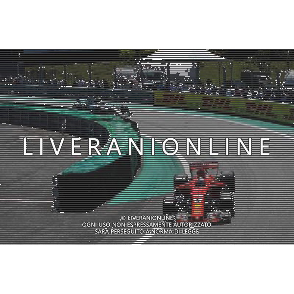 Sebastian Vettel (GER) Ferrari SF70H leads Valtteri Bottas (FIN) Mercedes AMG F1 W08. 12.11.2017. Formula 1 World Championship, Rd 19, Brazilian Grand Prix, Sao Paulo, Brazil, Race Day. AG ALDO LIVERANI SAS ONLY ITALY