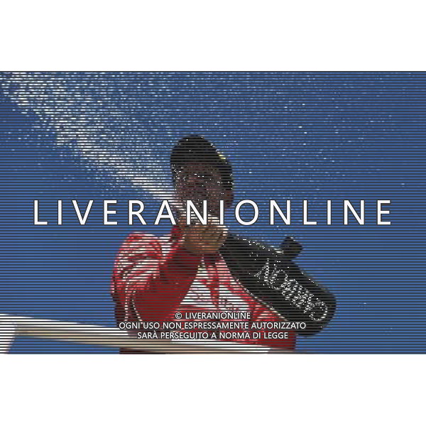 Race winner Sebastian Vettel (GER) Ferrari celebrates with the champagne on the podium. 12.11.2017. Formula 1 World Championship, Rd 19, Brazilian Grand Prix, Sao Paulo, Brazil, Race Day. AG ALDO LIVERANI SAS ONLY ITALY