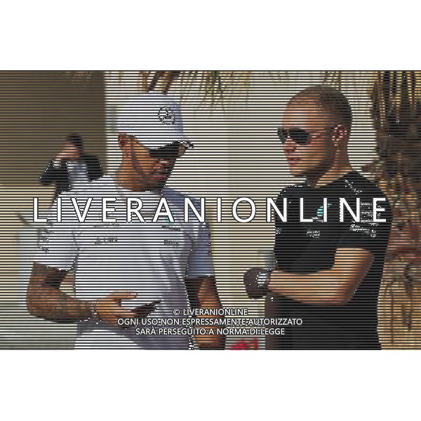 (L to R): Lewis Hamilton (GBR) Mercedes AMG F1 with team mate Valtteri Bottas (FIN) Mercedes AMG F1. 23.11.2017. Formula 1 World Championship, Rd 20, Abu Dhabi Grand Prix, Yas Marina Circuit, Abu Dhabi, Preparation Day. / AGENZIA ALDO LIVERANI SAS - ITALY ONLY EDITORIAL USE ONLY - GP F1 Abu Dhabi Emirati Arabi Uniti - Preparation Day - 23/11/2017 
