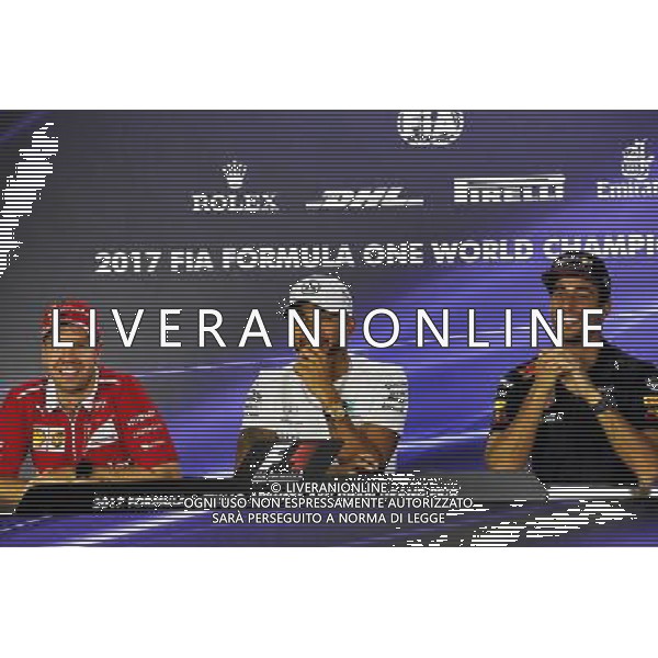 The FIA Press Conference (L to R): Sebastian Vettel (GER) Ferrari; Lewis Hamilton (GBR) Mercedes AMG F1; Daniel Ricciardo (AUS) Red Bull Racing. 23.11.2017. Formula 1 World Championship, Rd 20, Abu Dhabi Grand Prix, Yas Marina Circuit, Abu Dhabi, Preparation Day. / AGENZIA ALDO LIVERANI SAS - ITALY ONLY EDITORIAL USE ONLY - GP F1 Abu Dhabi Emirati Arabi Uniti - Preparation Day - 23/11/2017 
