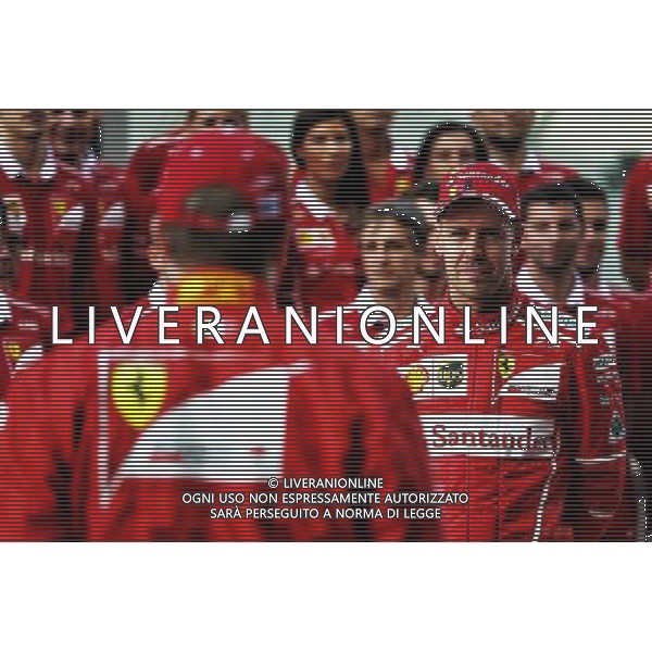 Sebastian Vettel (GER) Ferrari with team mate Kimi Raikkonen (FIN) Ferrari at a team photograph. 23.11.2017. Formula 1 World Championship, Rd 20, Abu Dhabi Grand Prix, Yas Marina Circuit, Abu Dhabi, Preparation Day. / AGENZIA ALDO LIVERANI SAS - ITALY ONLY EDITORIAL USE ONLY - GP F1 Abu Dhabi Emirati Arabi Uniti - Preparation Day - 23/11/2017 