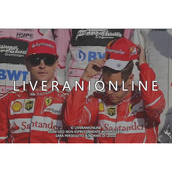 Kimi Raikkonen (FIN) Scuderia Ferrari and Sebastian Vettel (GER) Scuderia Ferrari 26.11.2017. Formula 1 World Championship, Rd 20, Abu Dhabi Grand Prix, Yas Marina Circuit, Abu Dhabi, Race Day. AG ALDO LIVERANI SAS ONLY ITALY