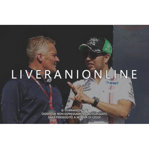 (L to R): Johnny Herbert (GBR) Sky Sports F1 Presenter with Sergio Perez (MEX) Sahara Force India F1. 26.11.2017. Formula 1 World Championship, Rd 20, Abu Dhabi Grand Prix, Yas Marina Circuit, Abu Dhabi, Race Day. AG ALDO LIVERANI SAS ONLY ITALY