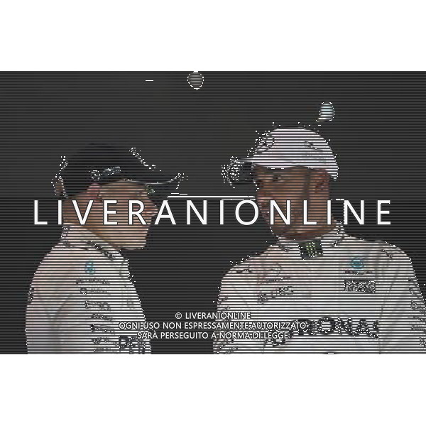 Valtteri Bottas (FIN) Mercedes AMG F1 W08 and Lewis Hamilton (GBR) Mercedes AMG F1 W08. 26.11.2017. Formula 1 World Championship, Rd 20, Abu Dhabi Grand Prix, Yas Marina Circuit, Abu Dhabi, Race Day. AG ALDO LIVERANI SAS ONLY ITALY