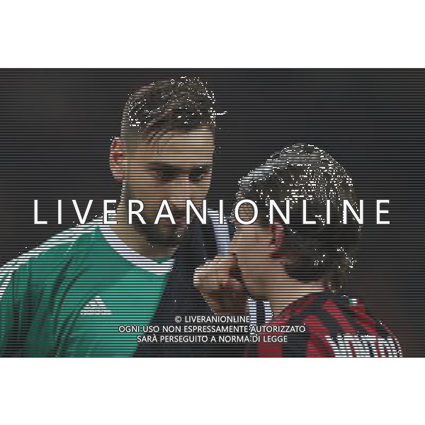 Coppa Italia TIM Cup 2017/2018 Ottavi di Finale Milano - 13.12.2017 Milan-Verona Nella Foto: gianluigi donnarumma con riccardo montolivo /Ph.Vitez-Ag. Aldo Liverani