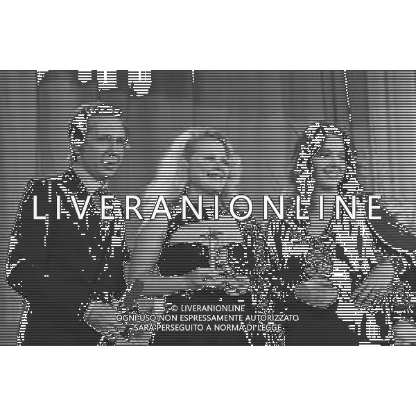 25mo Festival della canzone italiana al salone delle feste del casino\' di Sanremo 1975 - RETROSPETTIVA nella foto la vincitrice GILDA, pseudonimo di Rosangela Scalabrino con Mike Bongiorno e Sabina Ciuffini ©ARCHIVIO / AGENZIA ALDO LIVERANI SAS