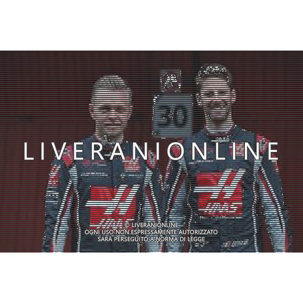 (L to R): Kevin Magnussen (DEN) Haas F1 Team with Romain Grosjean (FRA) Haas F1 Team. 26.02.2018. Formula One Testing, Day One, Barcelona, Spain. Monday. / AGENZIA ALDO LIVERANI SAS - ITALY ONLY EDITORIAL USE ONLY - Motor Racing - F1 Testing - Test One - Day 1 - Barcellona, Spagna 26 febbraio 2018
