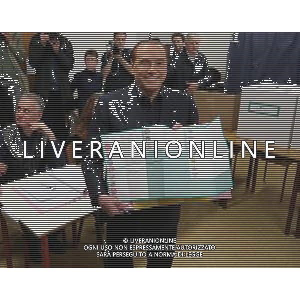 Elezioni Politiche 2018 Milano - 04.03.2018 Nella Foto:Votazione di Silvio Berlusconi e invasione al seggio di una Femen /Ph.Vitez-Ag. Aldo Liverani